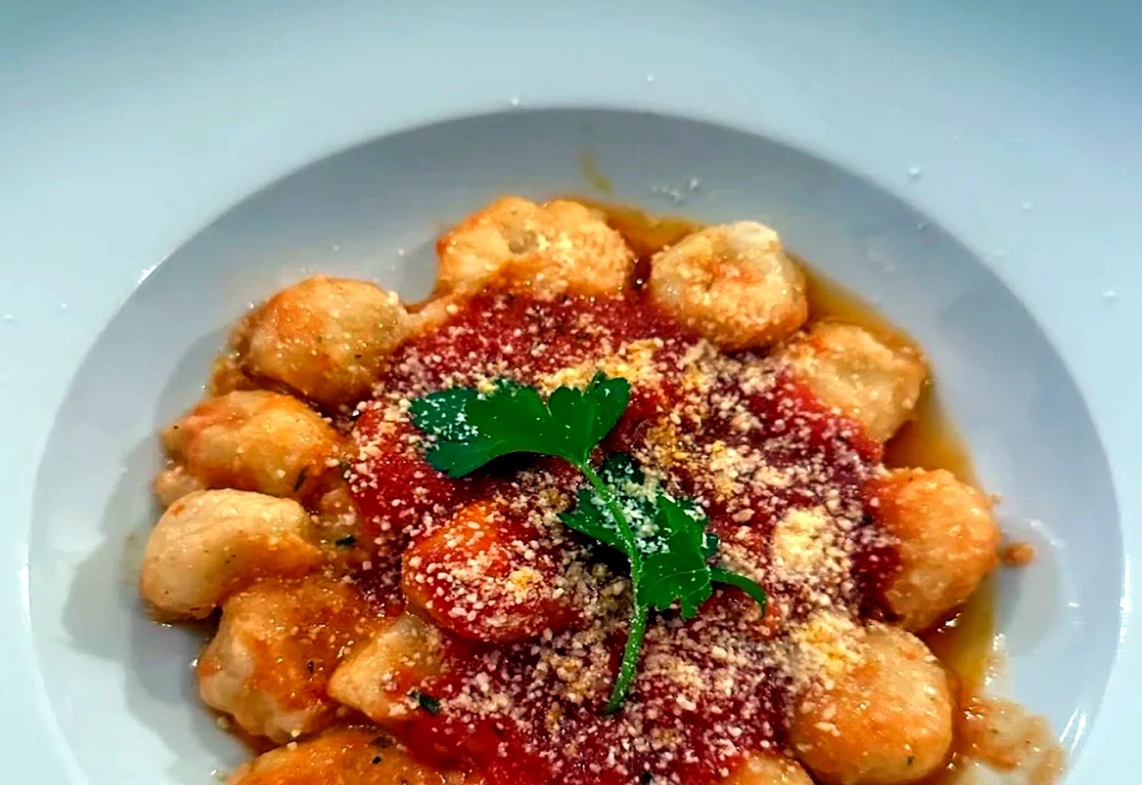 Gnocchi with tomato ragu and parmesan