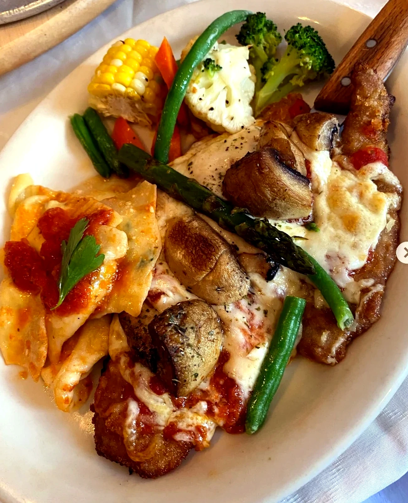 Italian entrée platter with vegetables and pasta